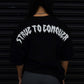 STRVE TO CONQUER TEE IN BLACK